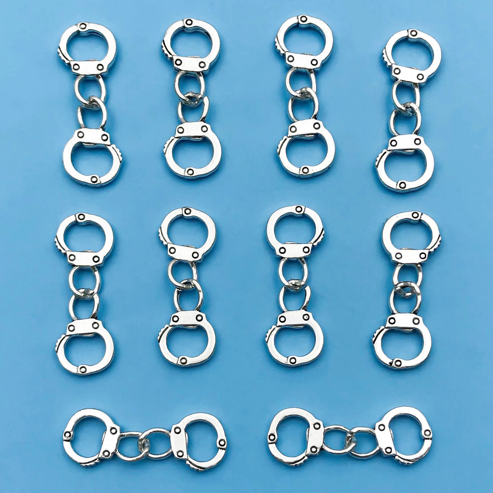 10/20 sztuk/paczka stop symulowane małe kajdanki Charms złącza Link kajdanki wisiorek do tworzenia biżuterii DIY akcesoria do rękodzieła
