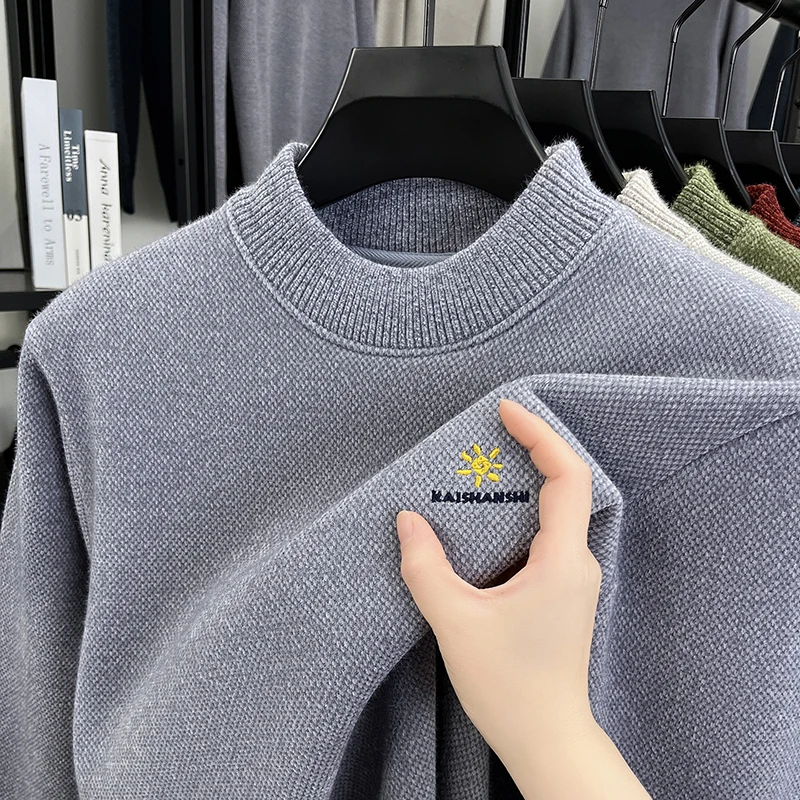 

Light luxury brand men's round neck long sleeved knitted pullover autumn winter fashionable daisy embroidery Korean warm sweater