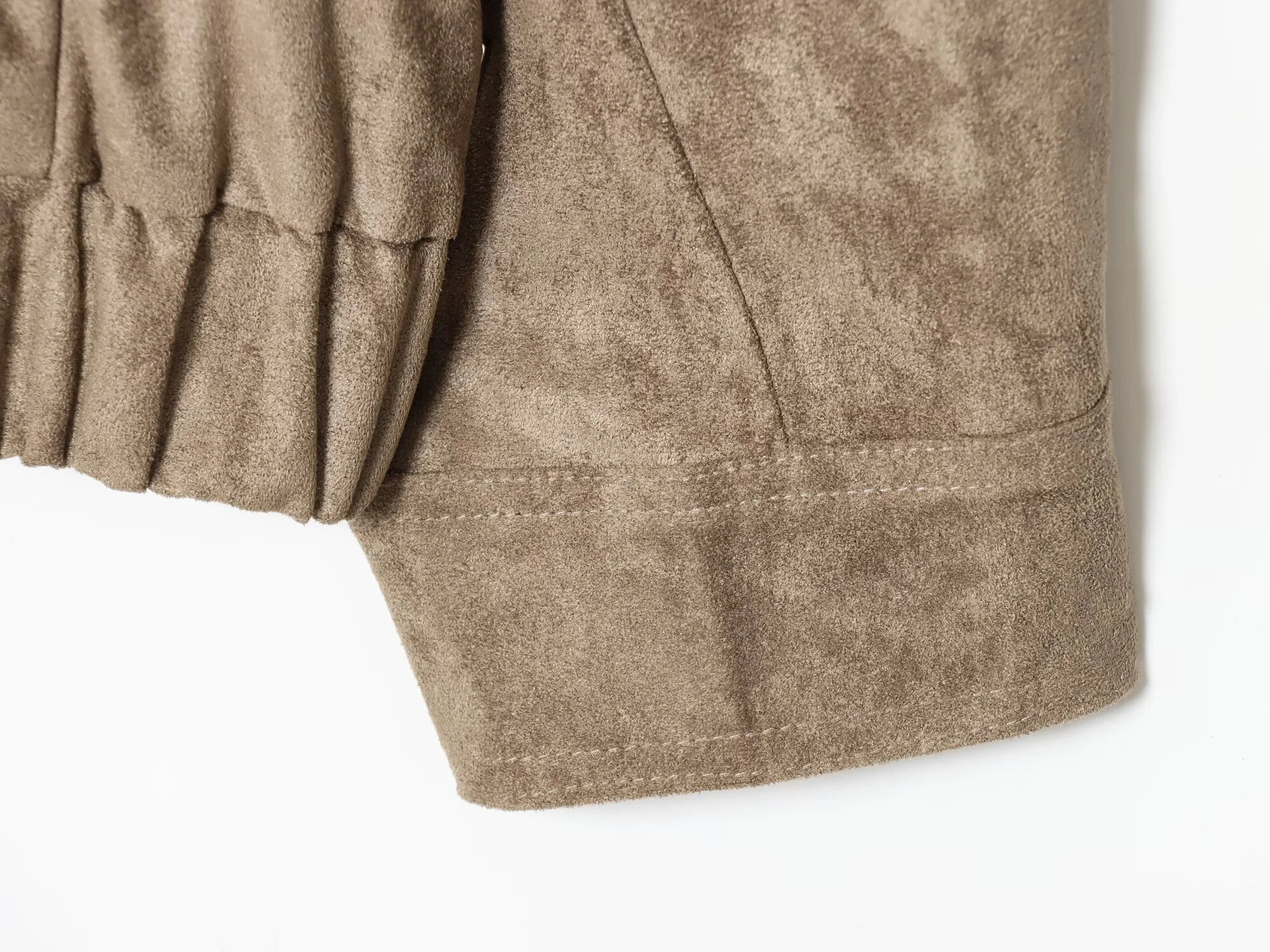 سترة جلدية فضفاضة للنساء لشتاء 2025 عصرية ومتعددة الاستخدامات وياقة واقفة وملمس من جلد الغزال #6