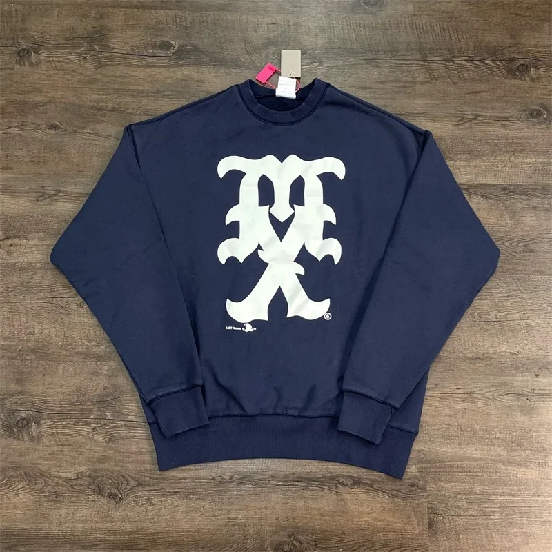 سويت شيرت رجالي بغطاء للرأس من القطن الخالص مطبوع عليه حروف كبيرة الحجم من Saint Michael باللون الأسود