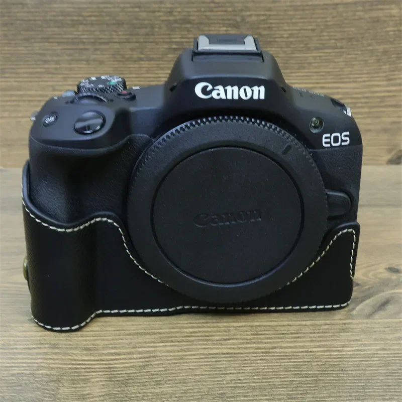 

For Canon EOS R50 R100 PU leather bottom bag case half cover protective sleeve base battery opening cover with wrist hand strap