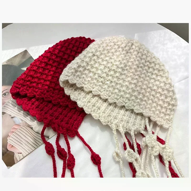 Autumn And Winter Warm Wool Hat Hand-woven Hollow Bag Hat Women's Ethnic Style Fringed Ear Protector Knitted Hat