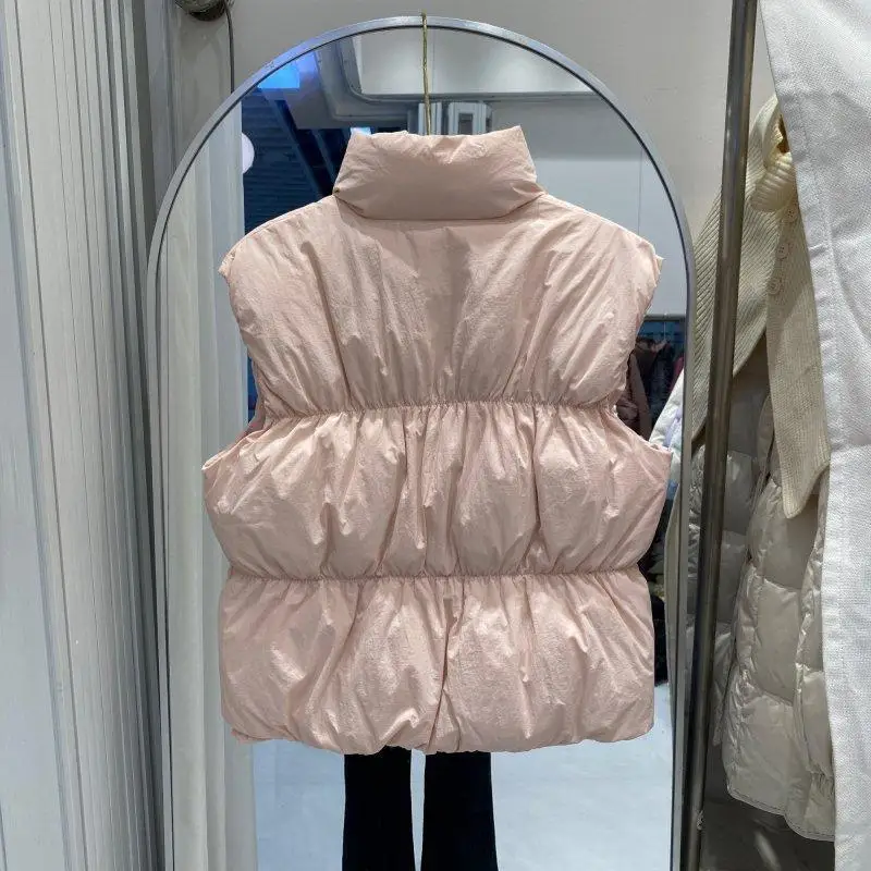 Herfst- en wintermode damesvest woon-werkverkeer opstaande kraag kort high street donsvest