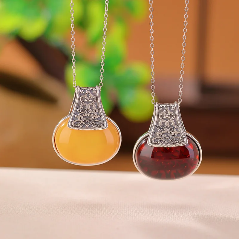 

S925 Sterling Silver Blood Amber Pattern Ethnic Style Hollow Pendant