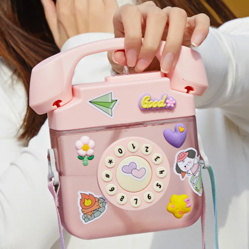 

Telephone Suction Nozzle Plastic Water Cup Creative Mini and Small Telephone Cup Shoulder Strap Children's Straw Water Bottle