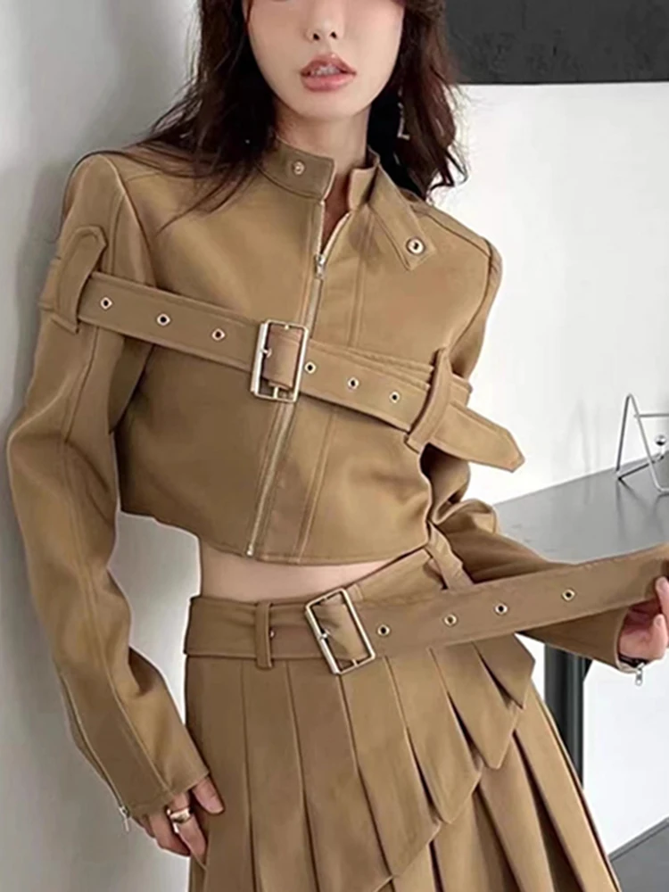 TWOTWINSTYLE Solid Streetwear Spliced Belt Crop Top For Women Stand Collar Long Sleeve Patchwork Zipper Designer Jackets Female