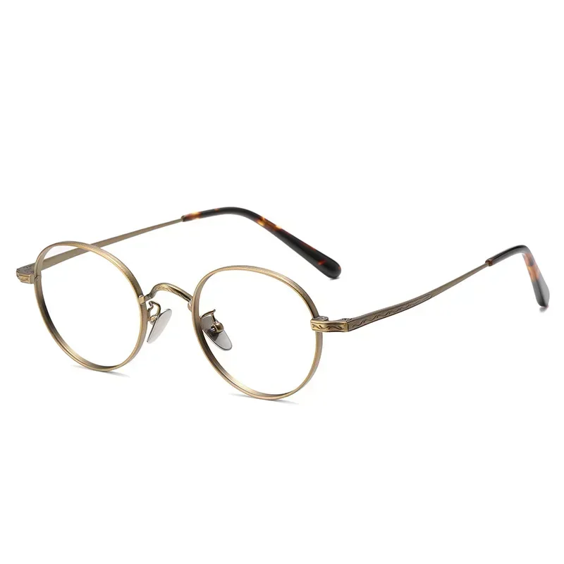 Occhiali classici rotondi in titanio retrò Montatura per occhiali da vista di lusso alla moda per uomo Donna Occhiali da vista con montatura per miopia ovale vintage