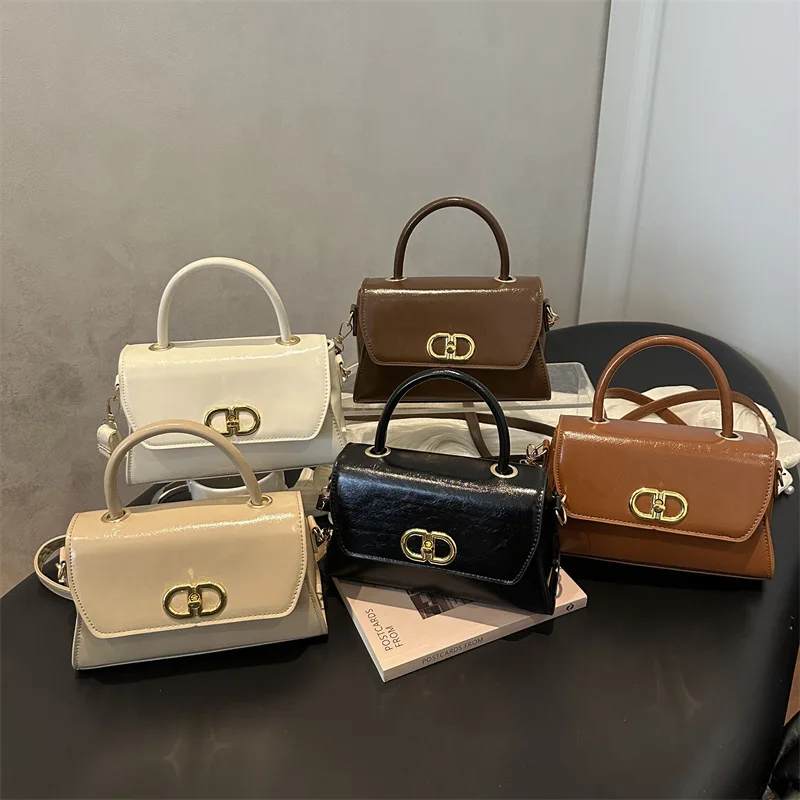 

Advanced texture hand-held small square bag, new fashionable buckle shoulder bag, commuting crossbody bag