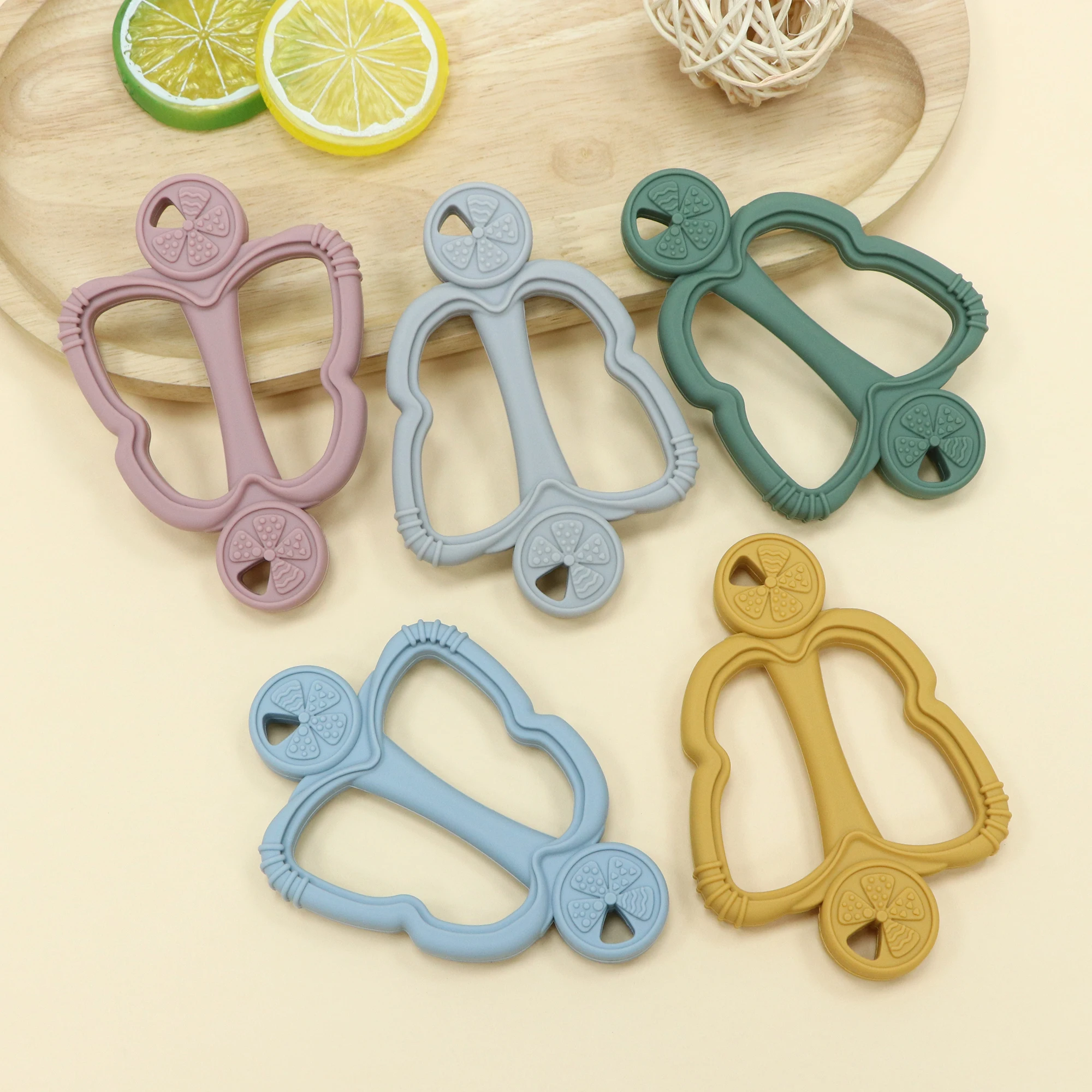 Siliconen bijtring uit één stuk met handvat, fruitbijtring, siliconen babybijtspeeltje, een essentieel item voor baby's tijdens het tandjes.