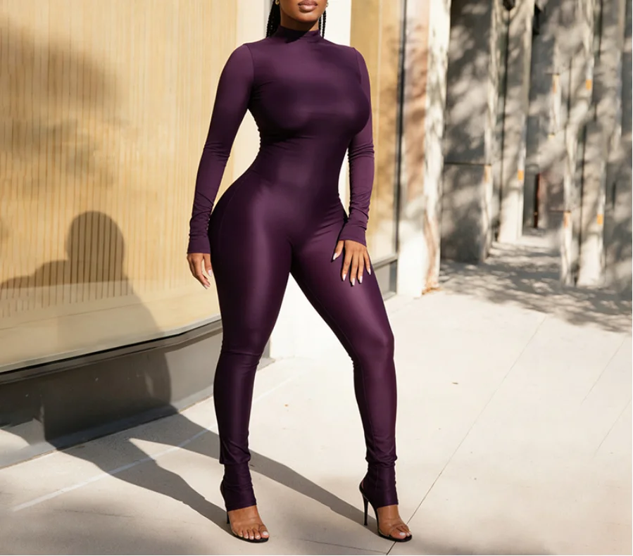 จั๊มสูทแขนยาวคอสูงปานกลางสีพื้นแบบรัดรูปมีซิปสำหรับฤดูใบไม้ร่วงและฤดูหนาว