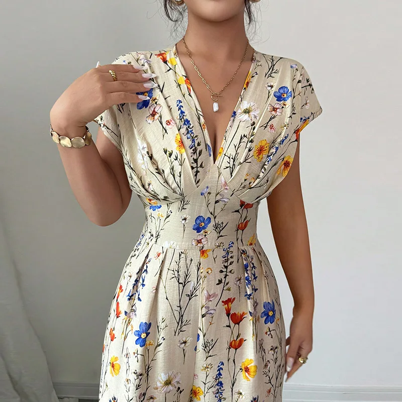 Lente en zomer Europese en Amerikaanse klassieke elegante damesjumpsuit met frisse bloemenprint, korte mouwen en hoge taille met rechte pijpen