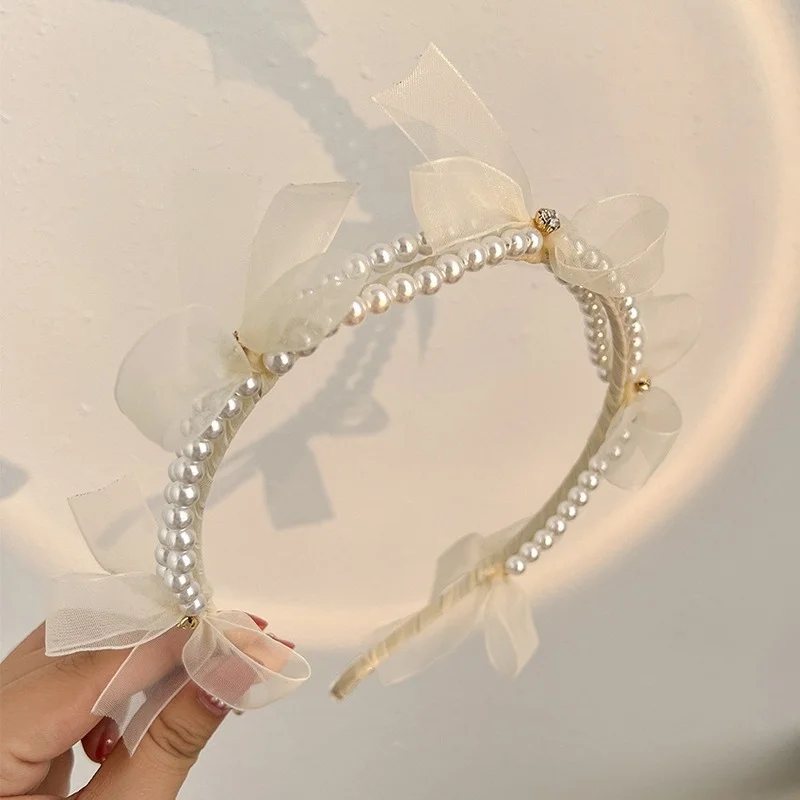 Design sense mesh bow pearl headband net red 2022 new hairpin headband female pressure hair hair bundle jewelry