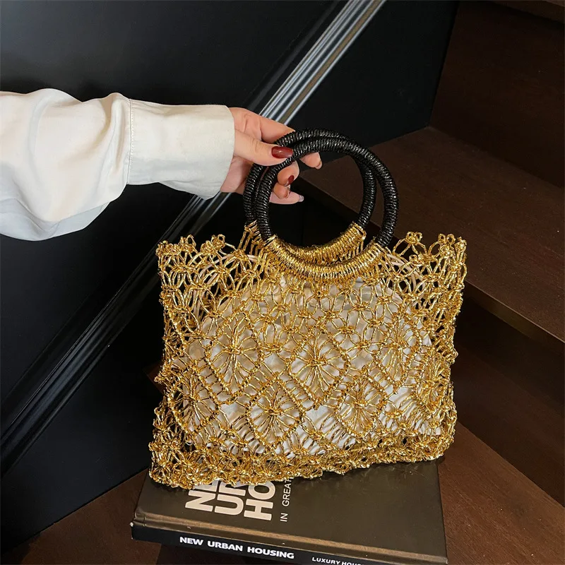 

Beach vacation bag for women in summer 2025, fashionable, niche, versatile, hand-held, large capacity hollow woven bag сумка ita