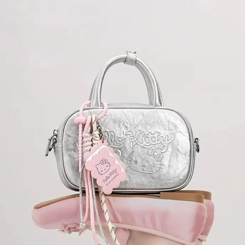 

Sanrio Hello Kitty 2025 Spring/Summer New Silver handbag Trend Versatile Boston Bag Korean Version Commuting Women Shoulder Bag