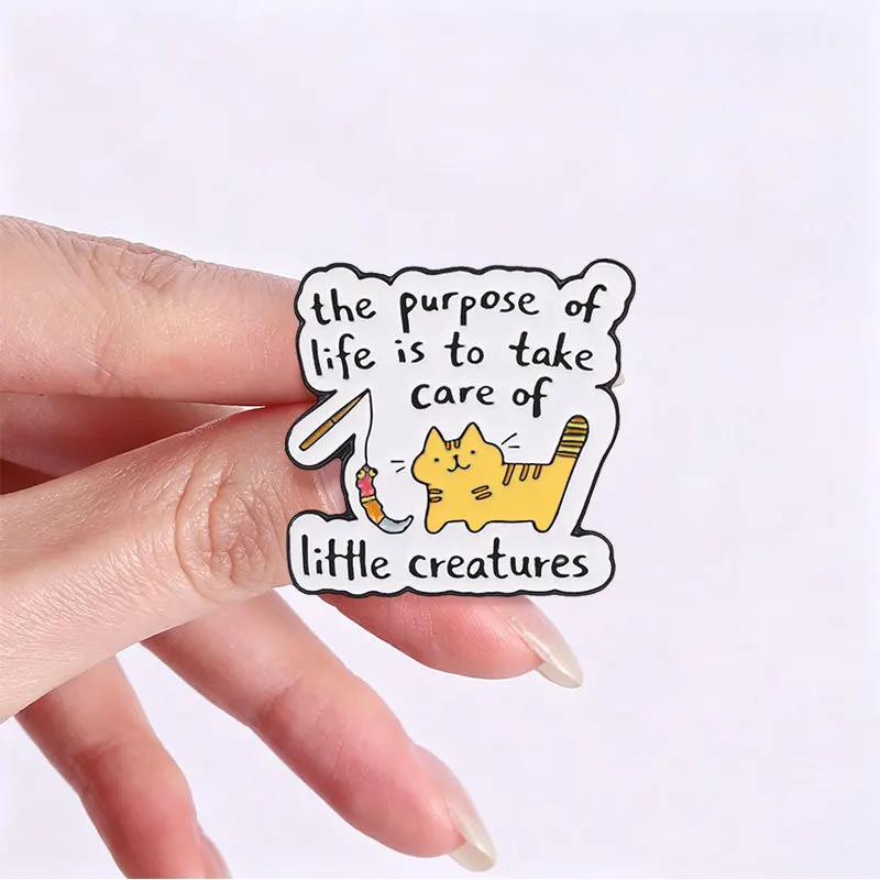 Creative Slogan The Purpose Of Life Is To Take Care Of Little Creatures Pins Brooch Cute Cat Meow Enamel Lapel Pin Accessory