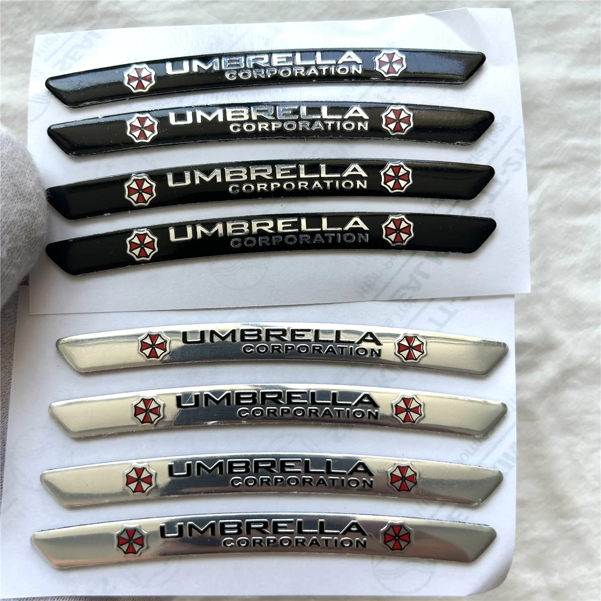 

Four sets of metal 3D aluminum alloy Resident Evil umbrella car logo suitable for body trunk tail side car sticker decal
