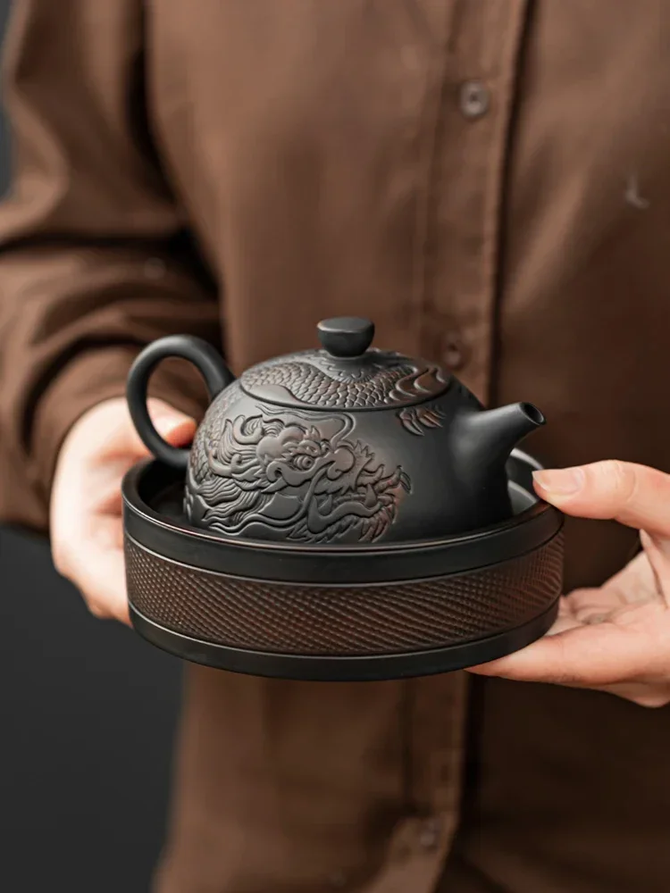 Purple pottery large-capacity teapot ceramic tea set manual jump knife pot creative home anti-hot tea maker