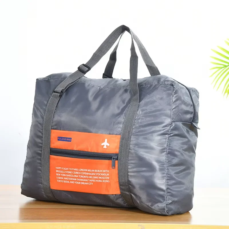 New foldable waterproof travel luggage bag, large capacity luggage storage bag, boarding luggage travel handbag, suitable for bu