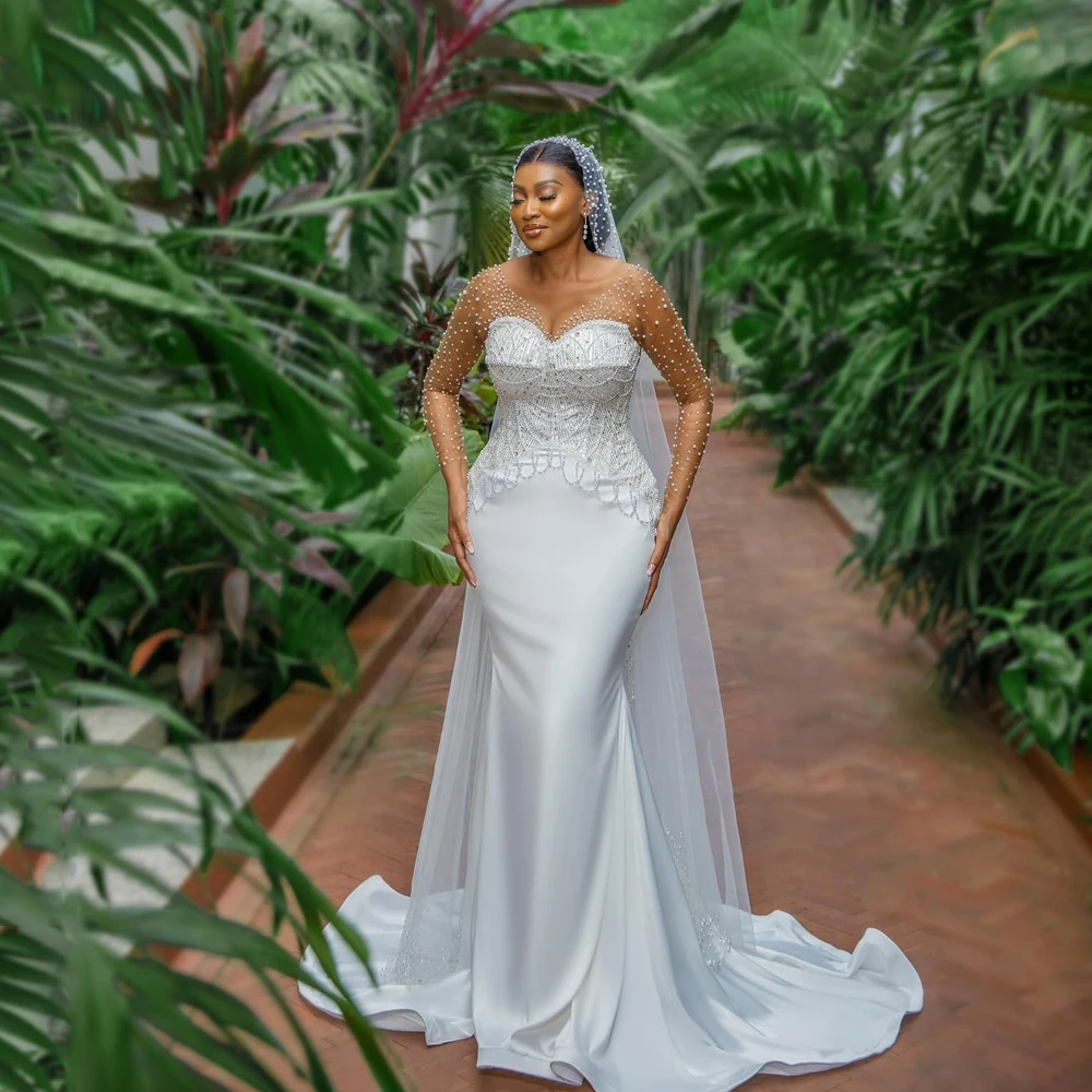 

Crystal Luxury Wedding Dresses For African Beaded O-Neck 2025 Mermaid Sequined Bride Dresses Illusion Sleeves Corset Customized