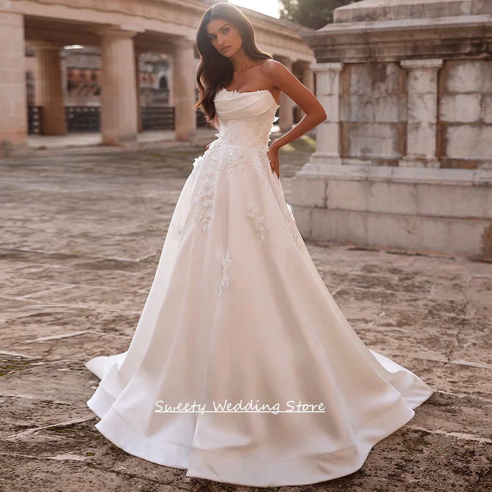 Elegant Satin A-Line Wedding Dress with Pearl Applique