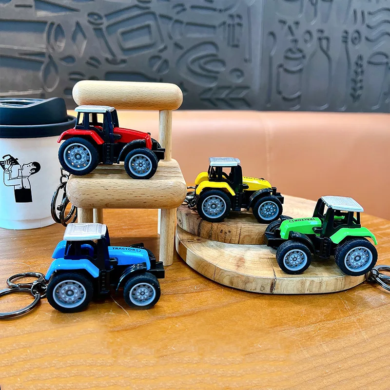 

Model Simulation Mini Car Tractor Skidding Farmer Children Birthday Gift Toys Children's Puzzle Toys Alloy key chains Pendants