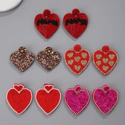 Rice bead earrings Heart-shaped Graph Fashion Originality Simple Bohemia Hand knitting Alloy Beaded earrings