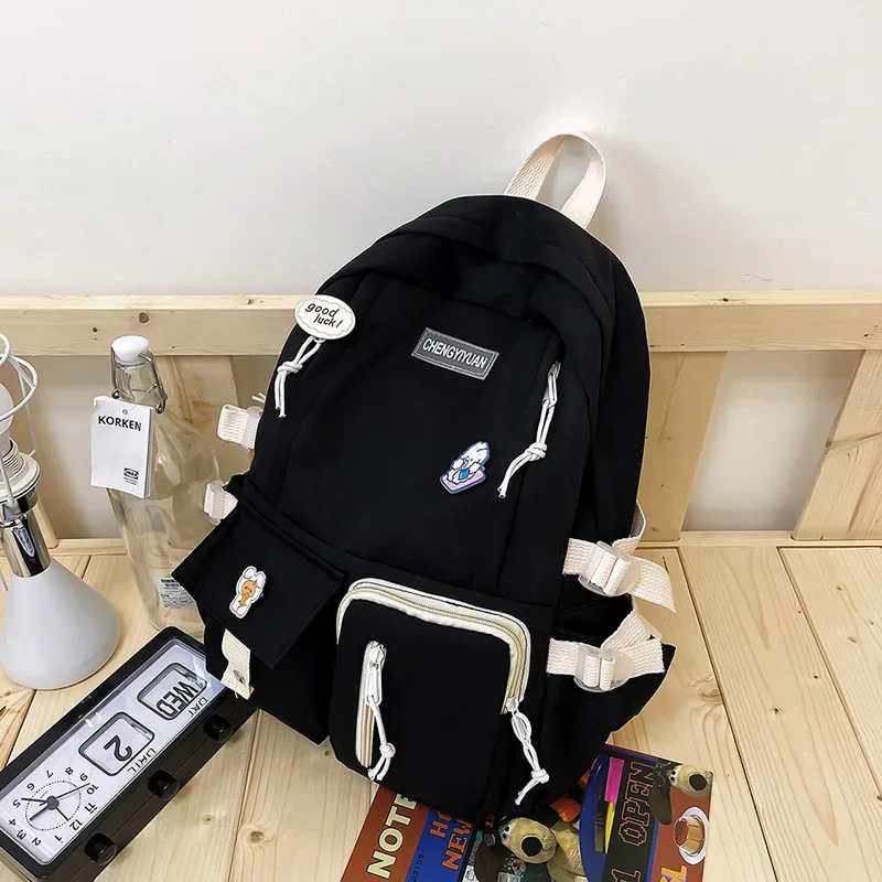 

Canvas Schoolbag Cute Backpack Zipper Large Capacity Junior High School Students Cute Backpack With Medal Pendant