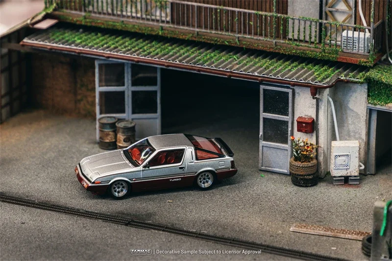 

Tarmac Works 1:64 Mit Starion Silver Dark red Model Car