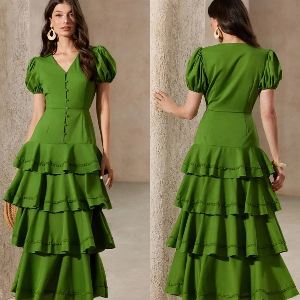 

Customized Modern Green Jersey Evening Dress Temperament V-Neck Puff Sleeves Short Sleeves Buttons Tiered Special Occasion Gowns