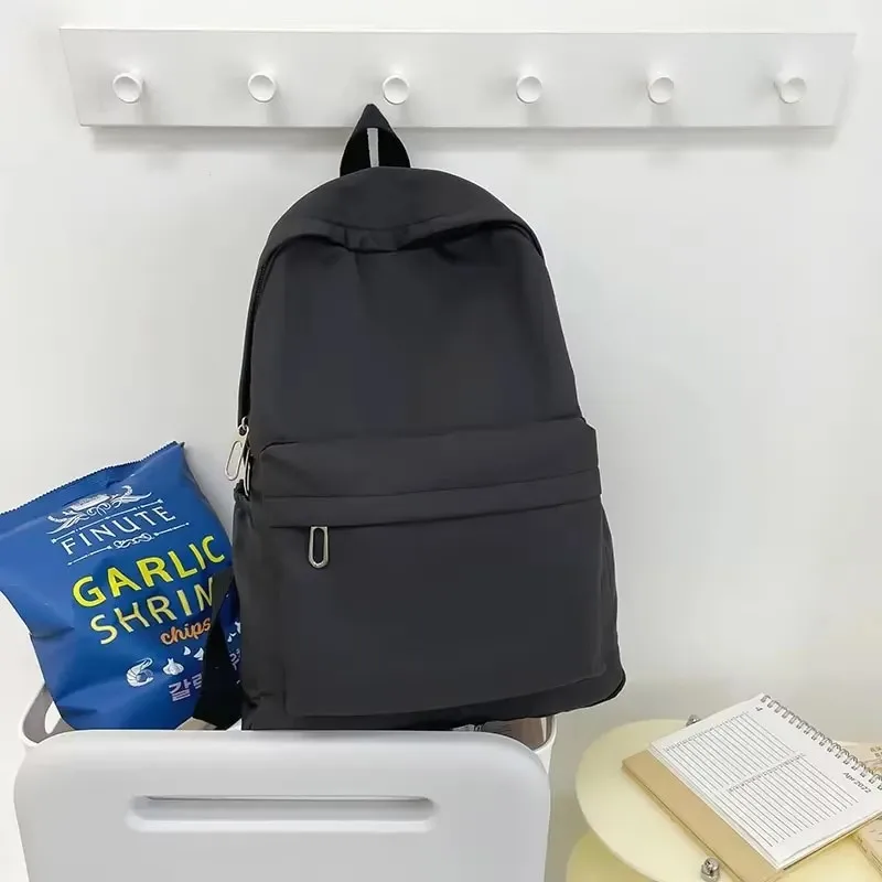 

Fashionable student schoolbag, simple solid color, large capacity, a casual double-shoulder bag for college students