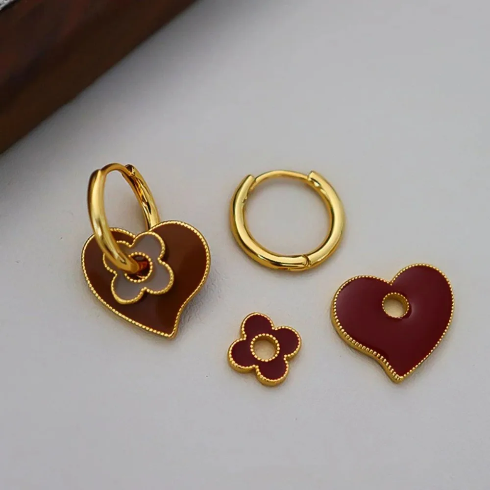 2026 السنة الجديدة الخريف الشتاء الأحمر النفط إسقاط أقراط ، موضة تنوعا الرجعية ضوء الفاخرة مكعب الزركون هوب القرط هدية الكريسماس #3