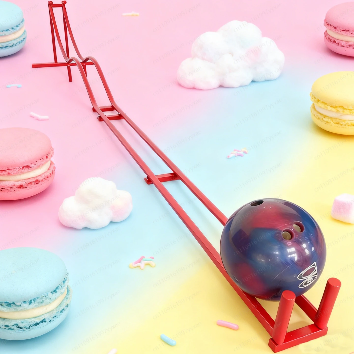 

The new bowling roller coaster is used as a prop for street vendor games and activities