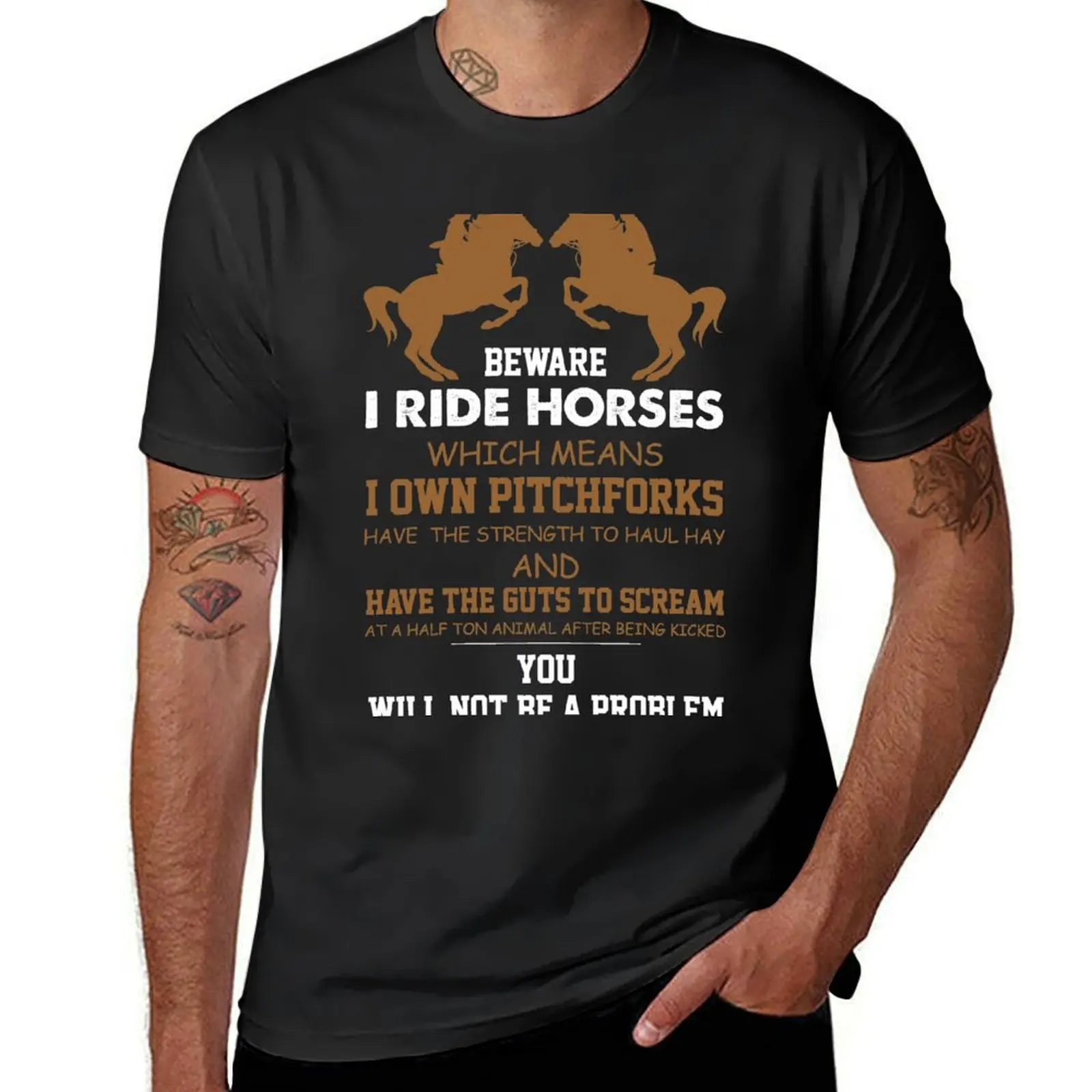 Beware I Ride Horses Which Means I Own Pitchforks Have The Strength To Haul Hay T-Shirt graphics mens champion t shirts