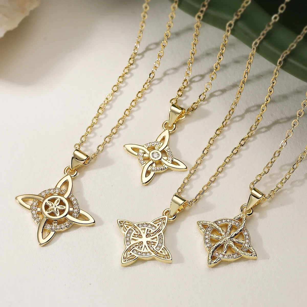 NEWBUY Gold Plated Hollow CZ Inlaid Celtic Witch Knot Pendant Necklace Four Pointed Lucky Wiccan Symbol Fashion Women Jewelry