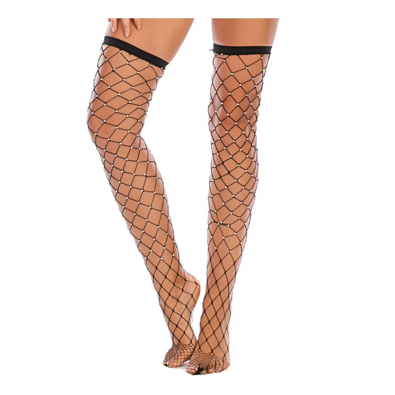 Calze a rete grandi scavate a caldo lucido sopra le calze al ginocchio
