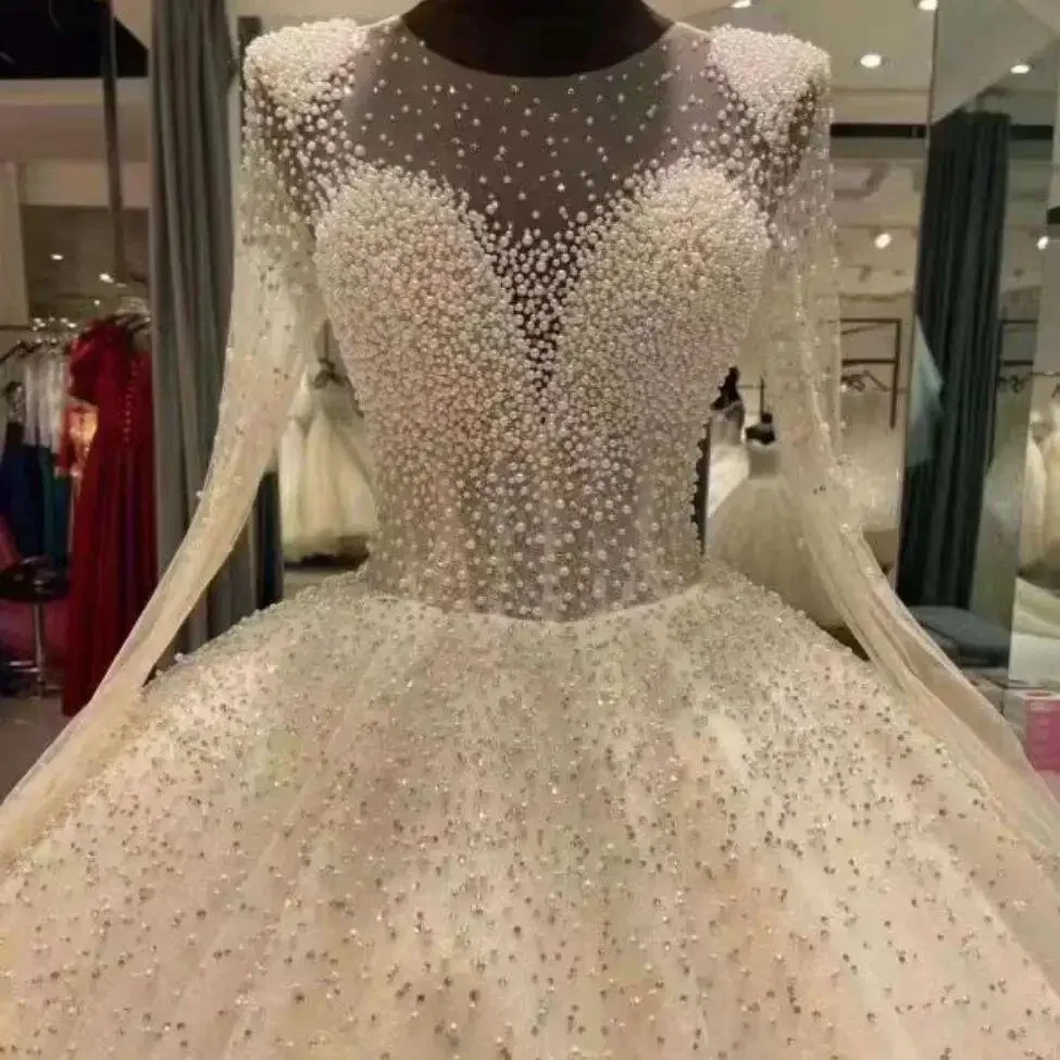 Customized Amazing Scoop Neck Heavy Pearls Beads Wedding Dress Abiti Da Sposa See Through Long Sleeves Ballgown Puffy Bridal