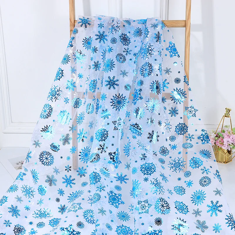 Organza bronceado azul gran copo de nieve tela navideña ropa para niños juguetes ropa de rendimiento tela