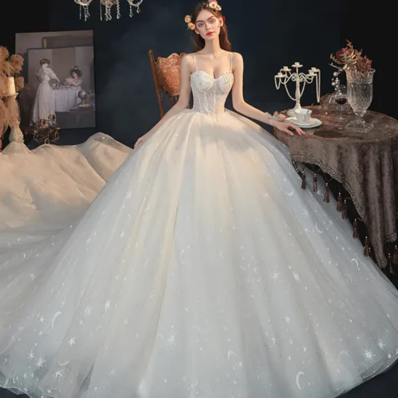 

Customized Women's Wedding Dress In 2025 With A Suspender And Large Skirt Dreamy And Romantic Full Of Fairy Tale Feeling