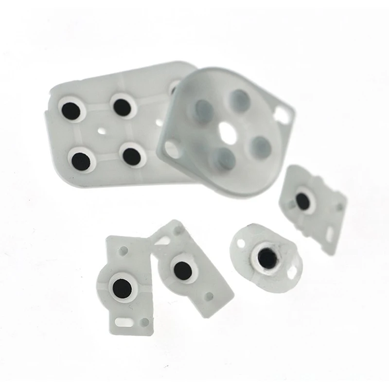 Yuxi แผ่นรองกุญแจ N64, แผ่นยางรองปุ่มนำไฟฟ้าแผ่นยางซิลิโคนสำหรับเปลี่ยนตัวควบคุม1ชุด