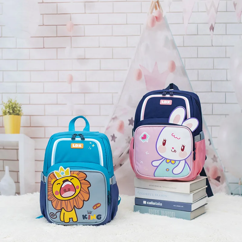 Cute Cartoon Little Lion Backpack, saco de redução de carga leve, proteção contra a espinha, mochila infantil para meninos e meninas