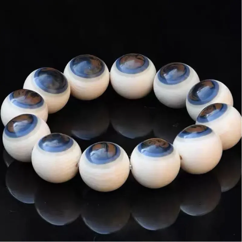 

Natural Mammoth Ivory Blue Eyes Bracelet for Men and Women Ice Material Buddha Bead Round Bead Hand Jewelry for Boyfriend Gift