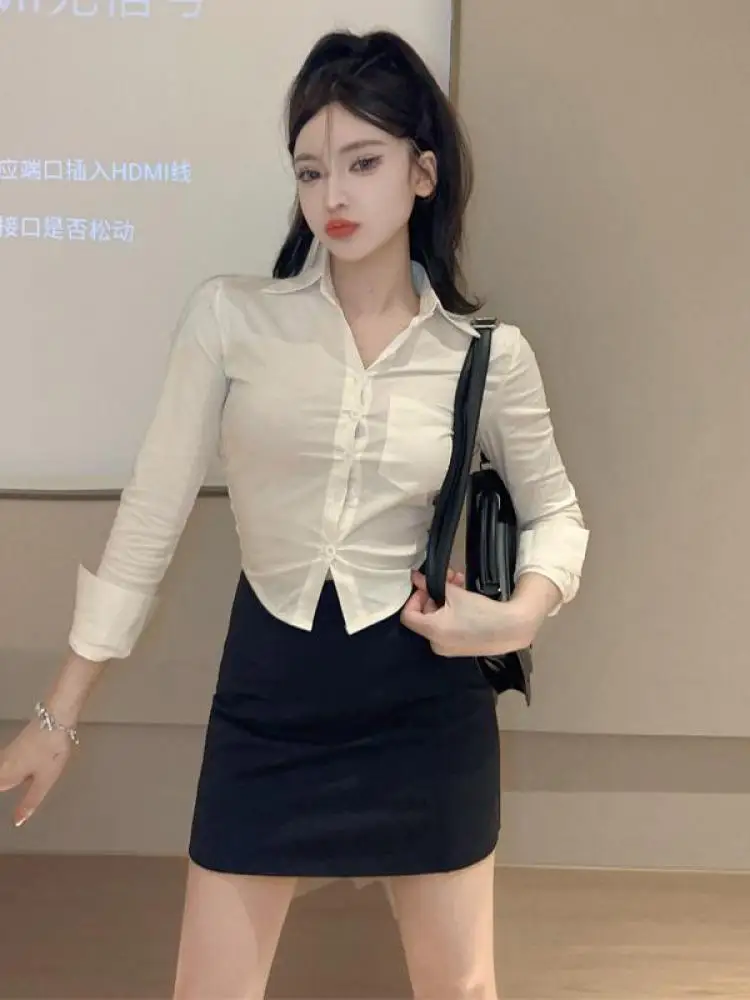 Coreano mujer otoño nueva moda azul blanco manga larga camisa de un solo pecho y negro de cintura alta Sexy Falda corta traje Popular