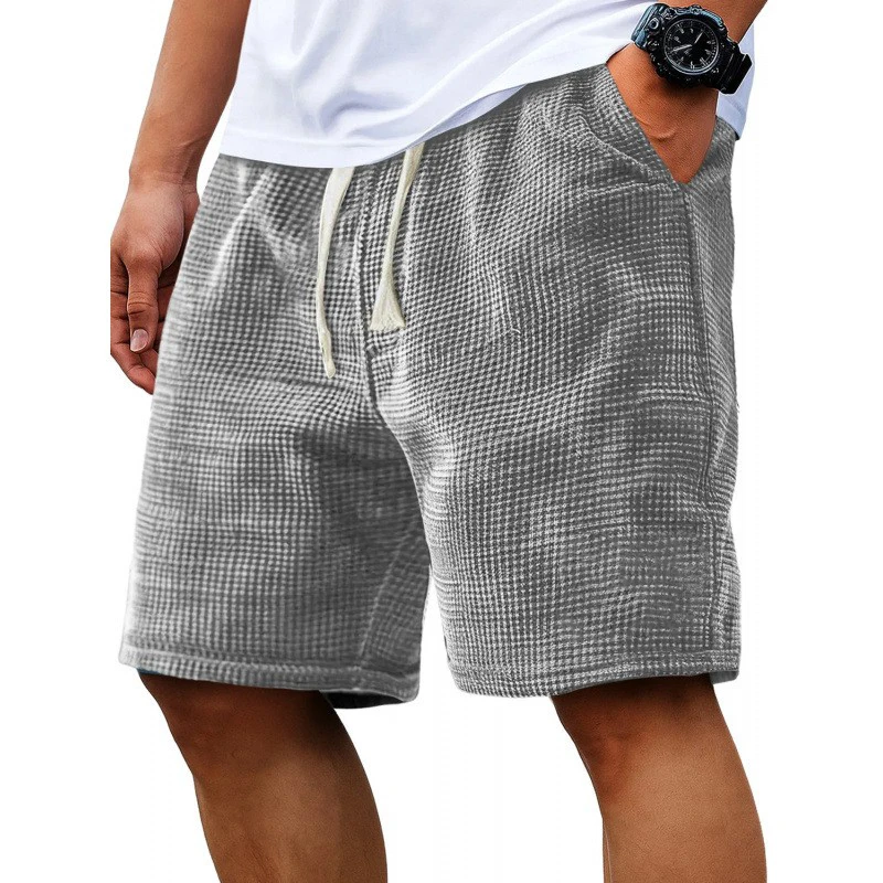 2026 men's solid color summer waffle shorts suitable for vacation and leisure, loose and breathable beach pants with pockets