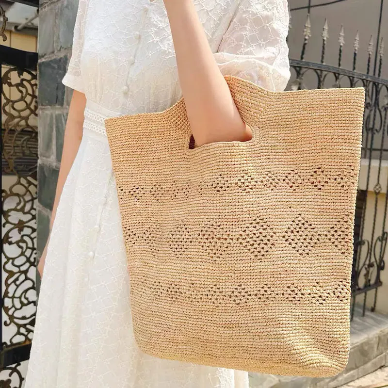 2025 New Summer Fashion Hollow Natural Lafite Grass Bag fashion Women Tote Bag Luxury High Quality Designer Style