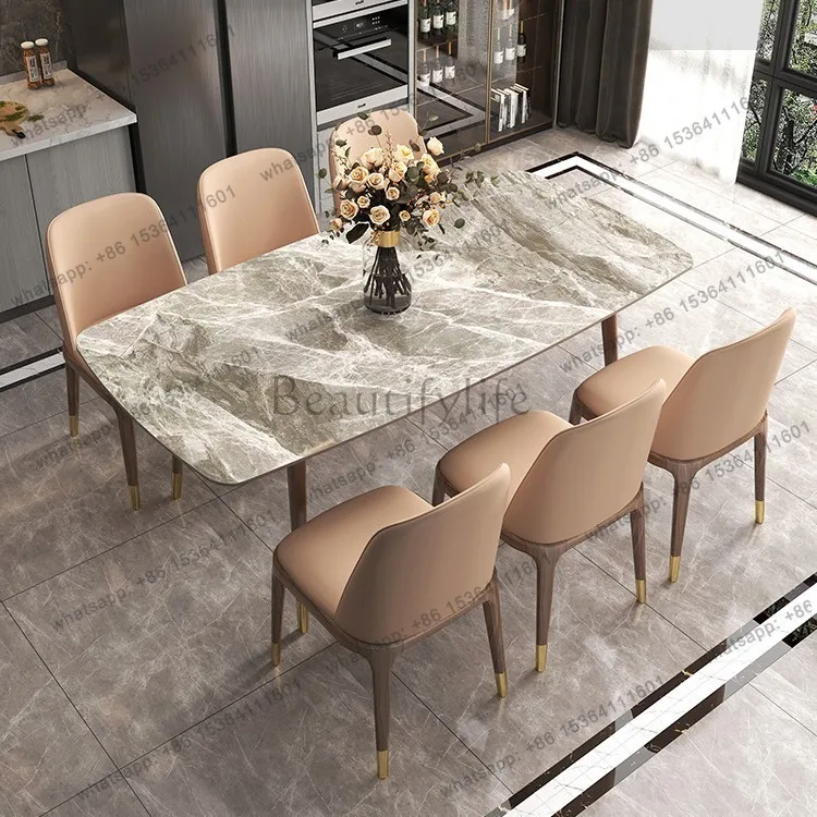

Italian rock slab dining table Modern simple light luxury household small apartment rock slab rectangular solid wood