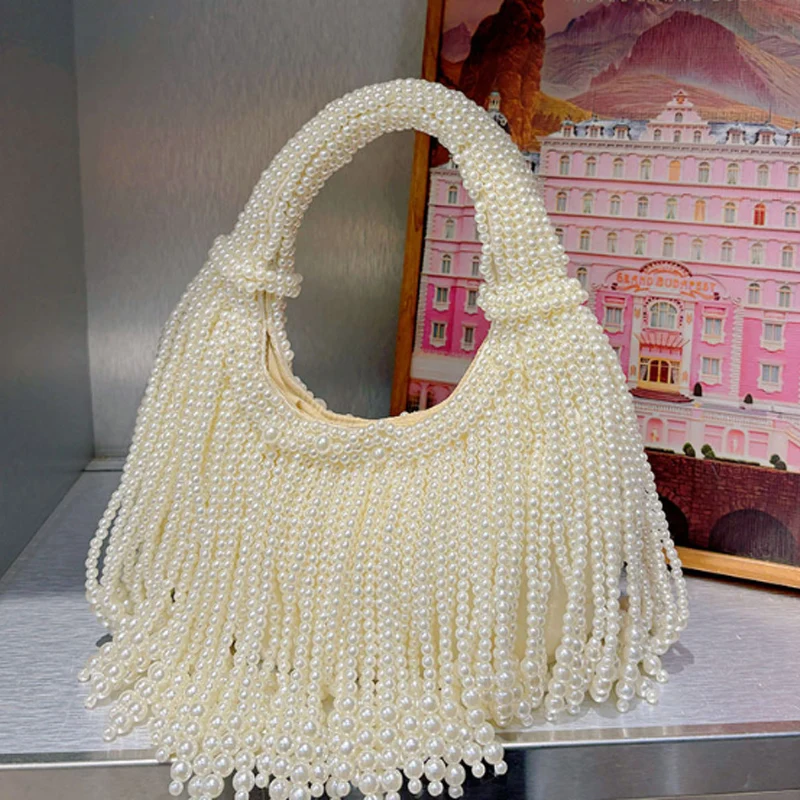 

2025 New Pearl Women's Bag Fashion Banquet Bag Hand woven Beaded Handbag Underarm Bag