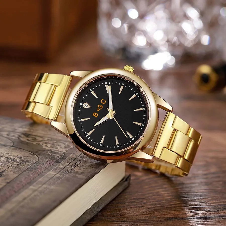 Jam Tangan Kuarsa Kustom Tali Baja Tahan Karat Warna Emas Dial Hitam Putih Tampilan Analog Cetak Nama dan Foto yang Dipersonalisasi