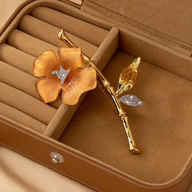 

Two tone bamboo flower series brooch