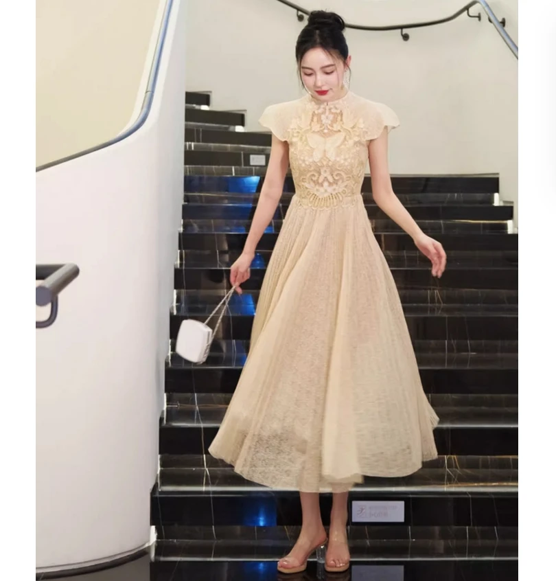 

French heavy industry embroidery champagne butterfly embroidery hollow out dress 2025 noble socialite long dress