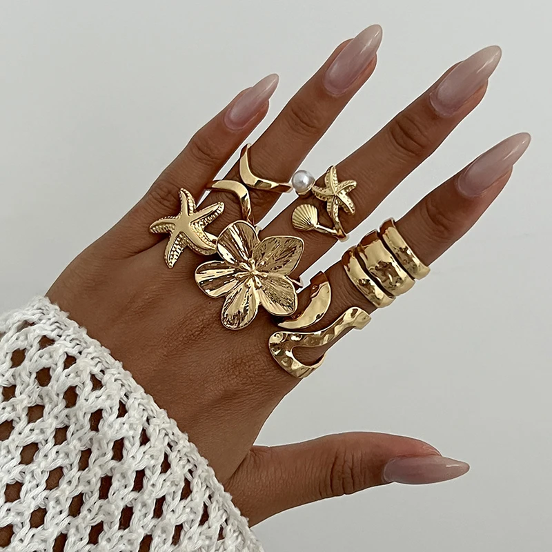 Conjunto de anillos de estrella de mar con flor Punk Vintage para hombre y mujer, anillo de nudillo de lujo con perlas multicapa de Metal, joyería para uso diario, 6 uds.